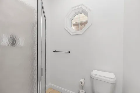 a view of a deck with wooden floor and outdoor space