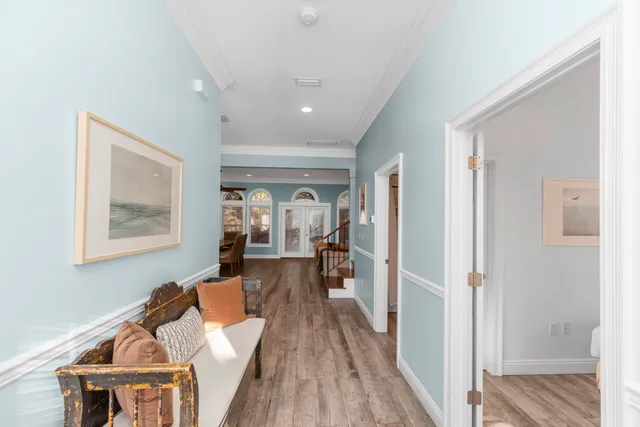 a bedroom with a bed and a lamp