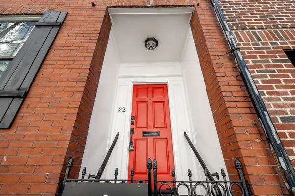 a view of a balcony with furniture