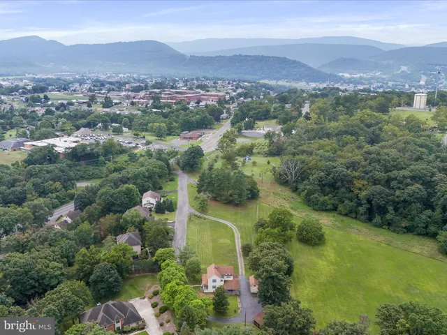 an aerial view of a city with lots of residential buildings