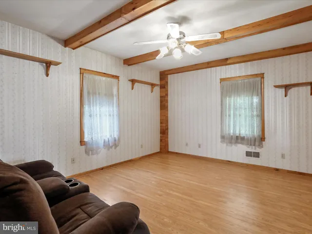 a view of livingroom with furniture and wooden floor