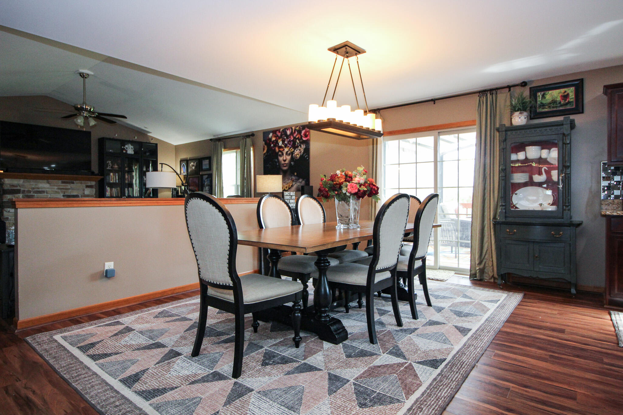 2913 Cardinal Drive Wheatfield, IN 46392 - Photo 14 of 34 a dining room with furniture a chandelier and window