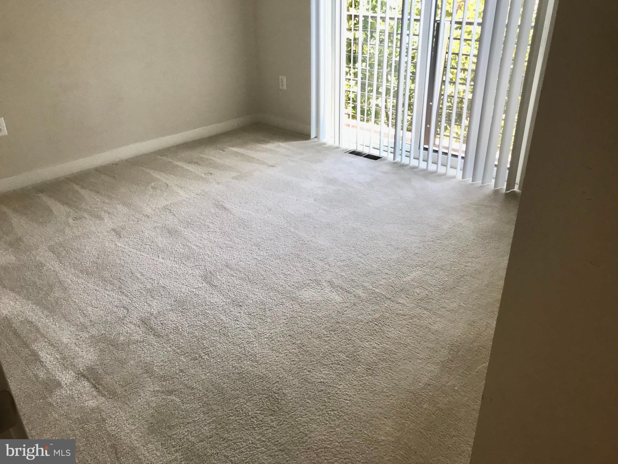 16316 Decker Place Rockville, MD 20855 - Photo 19 of 27 a view of an empty room with a window