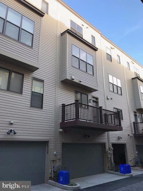 16316 Decker Place Rockville, MD 20855 - Photo 2 of 27 a front view of a house with entryway