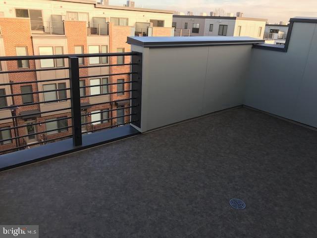 16316 Decker Place Rockville, MD 20855 - Photo 26 of 27 a view of a blue house with many windows