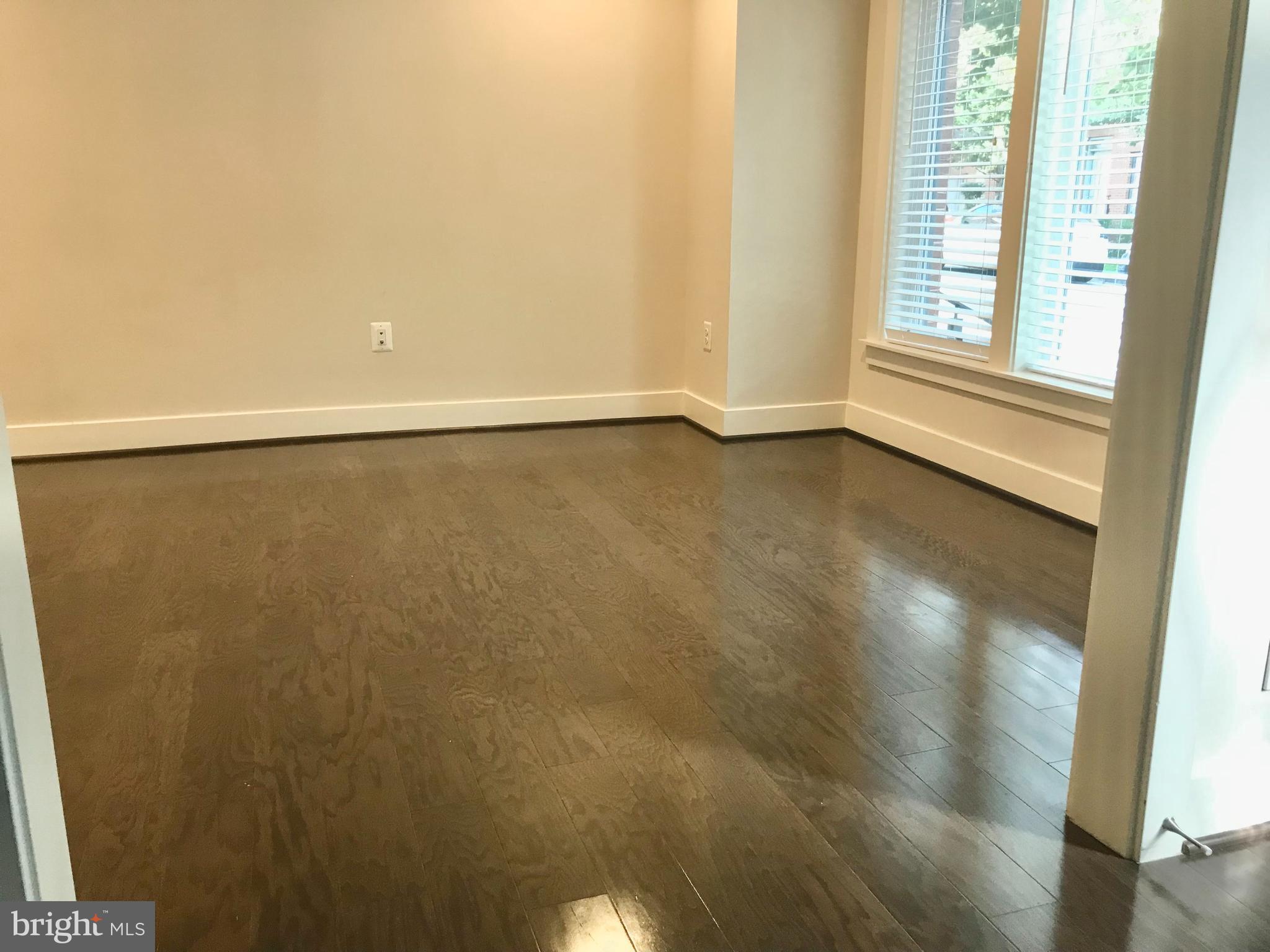 16316 Decker Place Rockville, MD 20855 - Photo 7 of 27 a view of an empty room with a window