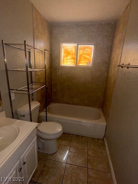 3106 Cummings Street North Las Vegas, NV 89030 - Photo 8 of 12 Full bathroom featuring vanity, light tile patterned flooring, and shower combination