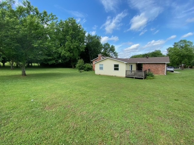 580 Vanderbilt Road Mount Juliet, TN 37122 - Photo 25 of 27 a view of a house with a backyard