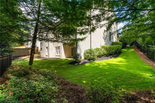 a view of backyard with green space