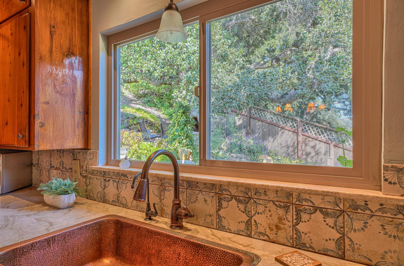 7 Paso Cresta Carmel Valley, CA 93924 - Photo 15 of 44 a kitchen with a sink and a large window