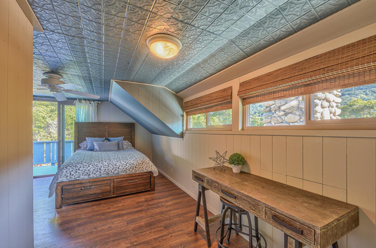 7 Paso Cresta Carmel Valley, CA 93924 - Photo 26 of 44 a bedroom with a bed and a window