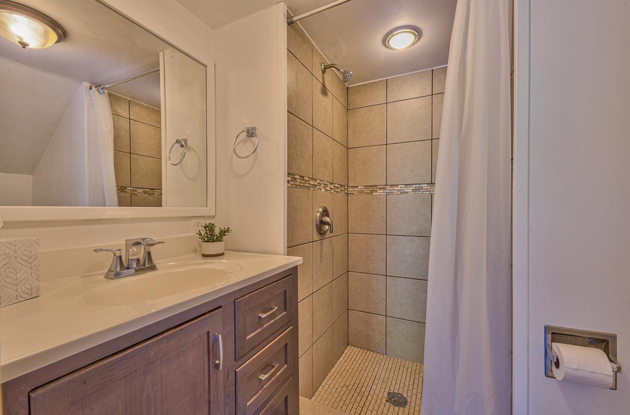 7 Paso Cresta Carmel Valley, CA 93924 - Photo 29 of 44 a bathroom with a sink shower and a mirror