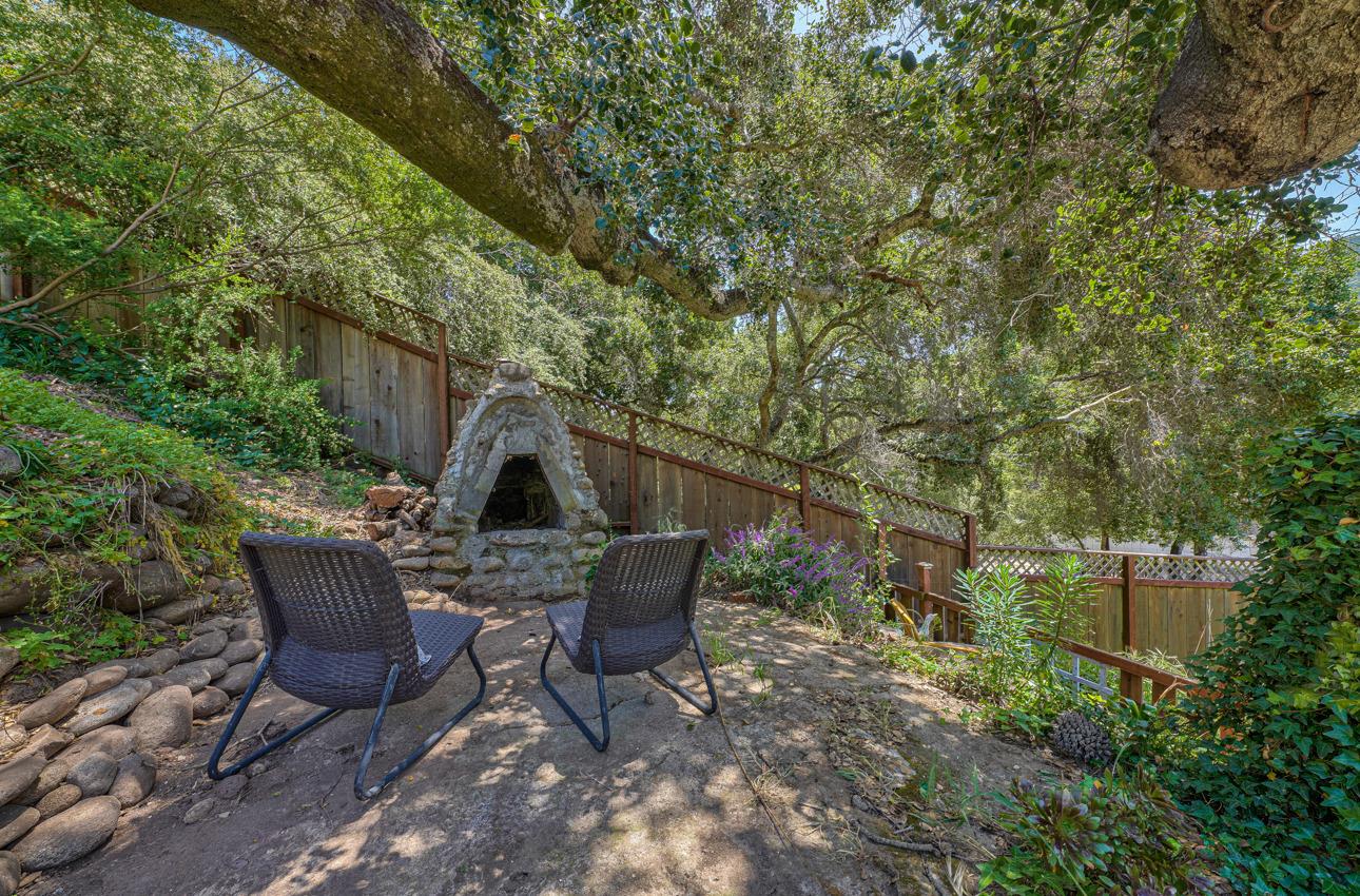 7 Paso Cresta Carmel Valley, CA 93924 - Photo 38 of 44 a view of backyard with seating space and trees