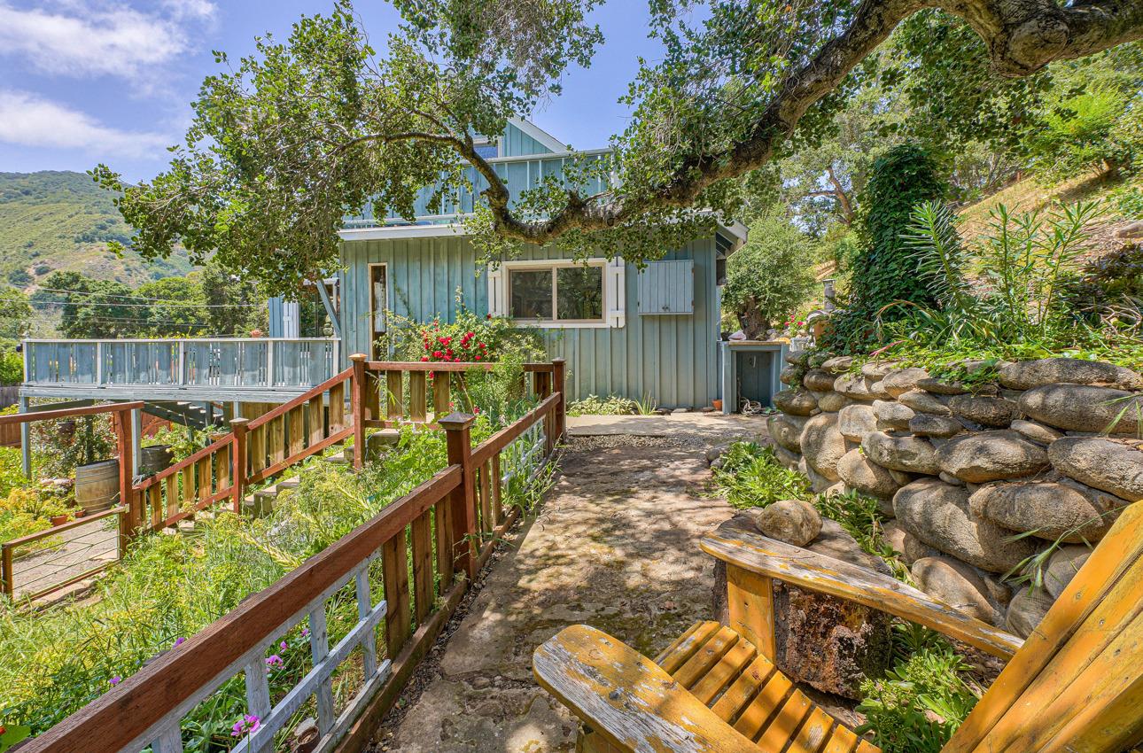 7 Paso Cresta Carmel Valley, CA 93924 - Photo 42 of 44 a balcony with wooden floor and outdoor seating