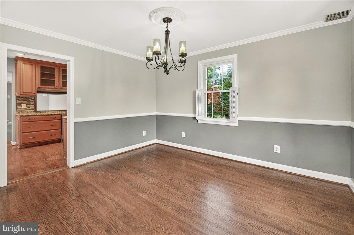 601 Culler Avenue Frederick, MD 21701 - Photo 32 of 146 Charming room with elegant chandelier.
