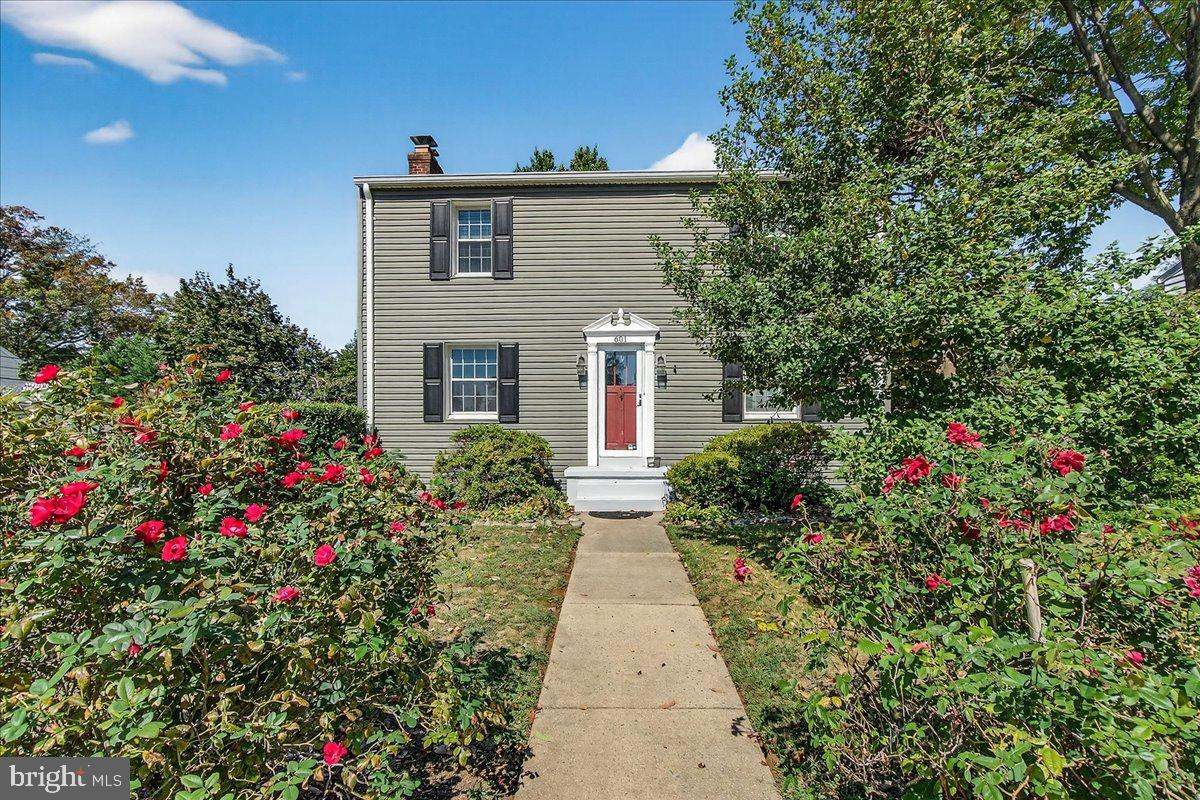 601 Culler Avenue Frederick, MD 21701 - Photo 90 of 146 Charming home framed by vibrant roses.