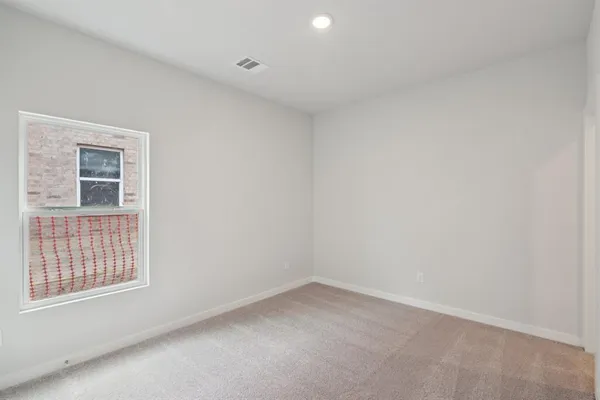 a bathroom with a granite countertop sink mirror toilet and bathtub