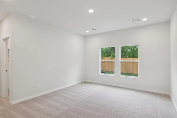 a view of a backyard with garden