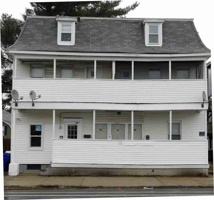 43-49 Oak Street Springfield, MA 01109 - Photo 2 of 8 a view of a house with a window