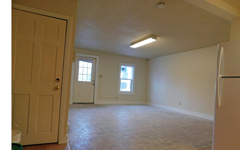 43-49 Oak Street Springfield, MA 01109 - Photo 4 of 8 a view of empty room with windows
