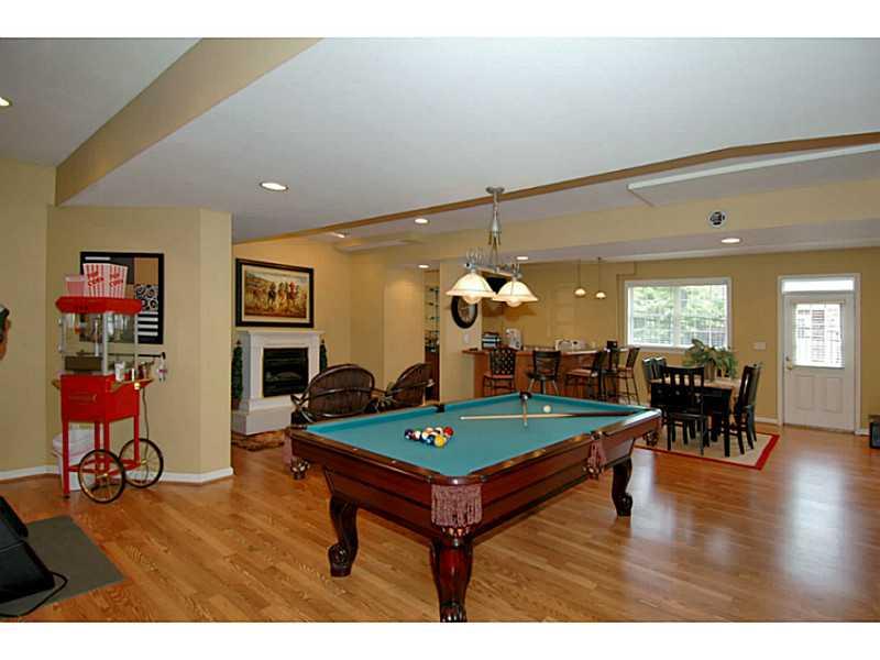 1837 Liberty Way Valencia, PA 16059 - Photo 17 of 25 Basement/Game Room. Entertain a crowd all year long in the finished Lower Level with fireplace and backyard access.