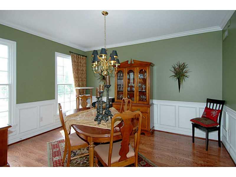 1837 Liberty Way Valencia, PA 16059 - Photo 3 of 25 Dining Room. The Dining Room with hardwood floors and wainscoting lends itself to stylish entertaining.