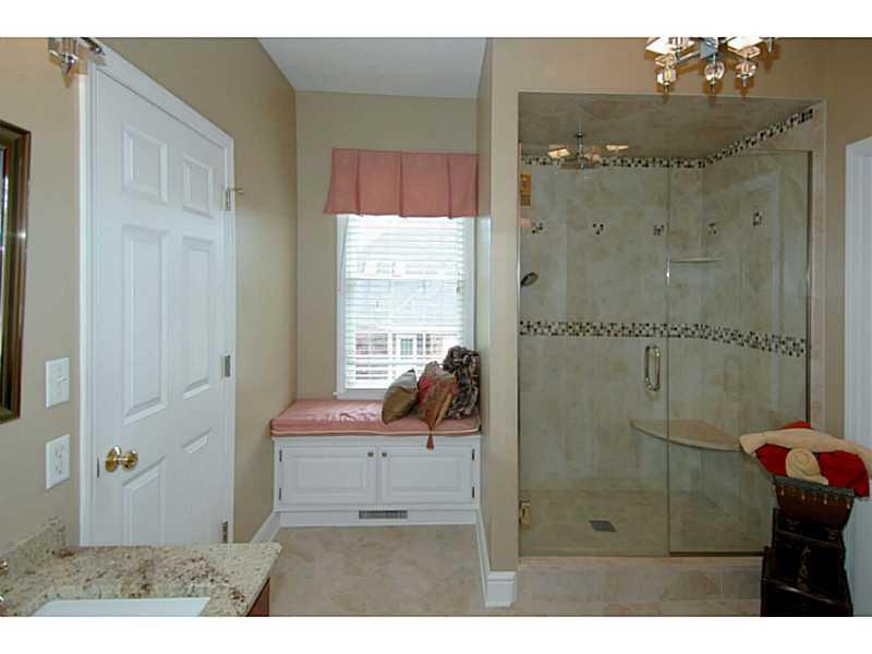 1837 Liberty Way Valencia, PA 16059 - Photo 10 of 25 Master Bath/Spa. New ceramic floor and new granite counters highlight the Master Bath with double sinks, new commode with soft close lid and ceramic shower with standard shower head and hand held spray.