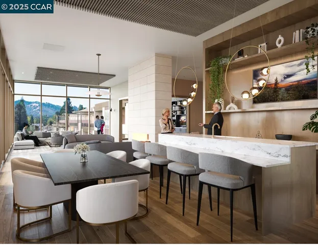 a view of a dining room with furniture and window