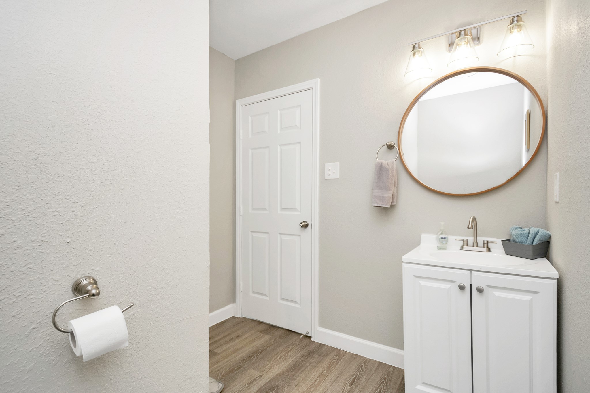 4710 Paradise Lane Houston, TX 77048 - Photo 26 of 42 a bathroom with a sink mirror and vanity