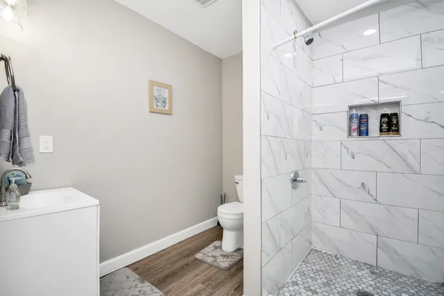 a bathroom with a sink and toilet