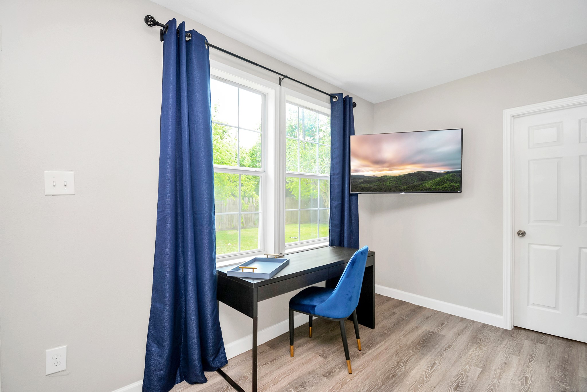 4710 Paradise Lane Houston, TX 77048 - Photo 29 of 42 a view of a workspace with furniture and a window