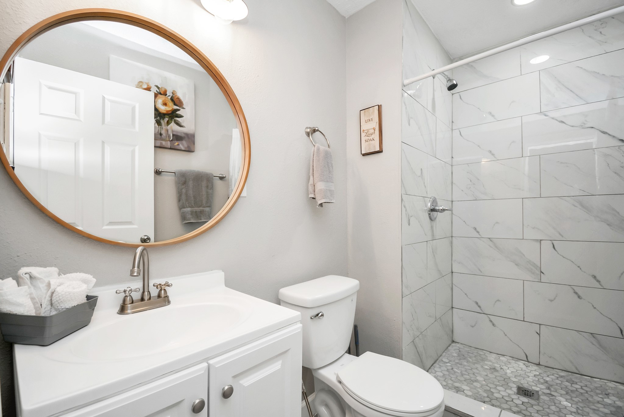 4710 Paradise Lane Houston, TX 77048 - Photo 35 of 42 a bathroom with a sink a toilet and a mirror