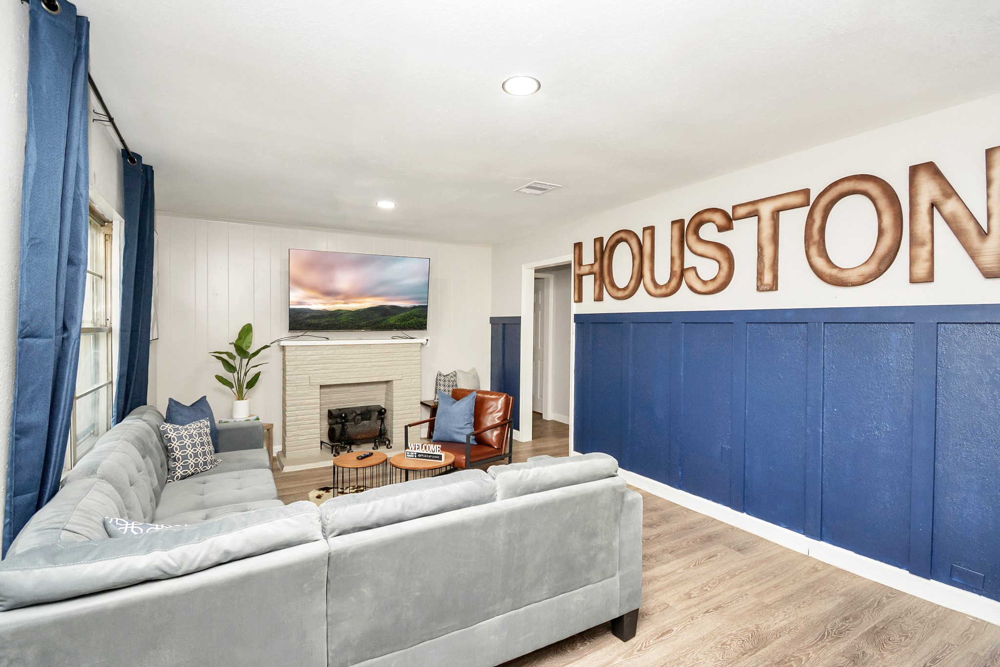4710 Paradise Lane Houston, TX 77048 - Photo 6 of 42 a living room with furniture and a fireplace