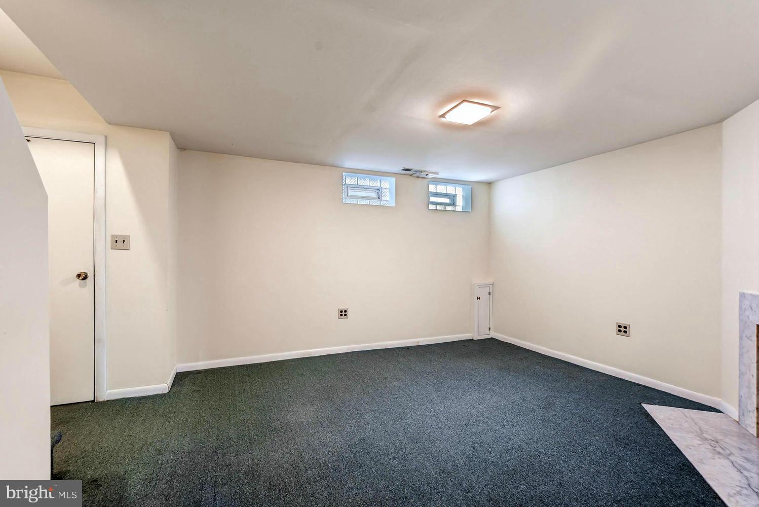 8325 Byington Road Baltimore, MD 21286 - Photo 24 of 28 an empty room with a empty space and windows