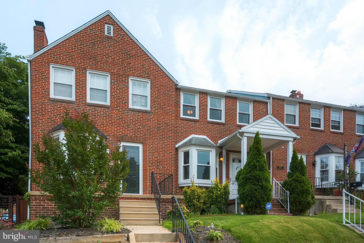 8325 Byington Road Baltimore, MD 21286 - Photo 3 of 28 a front view of a house with garden