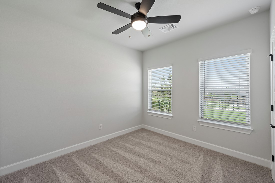 9316 Gladsome Path Manor, TX 78653 - Photo 11 of 18 a view of an empty room with a window