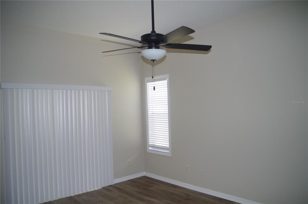 4207 Elba Place Valrico, FL 33596 - Photo 18 of 24 a view of a hallway with a window