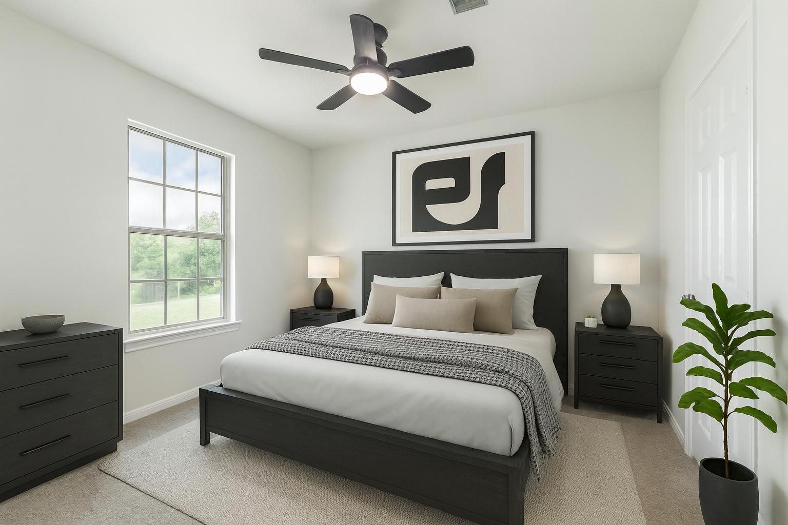 10102 Wiggins Street Houston, TX 77029 - Photo 17 of 26 a bedroom with a bed table and a window