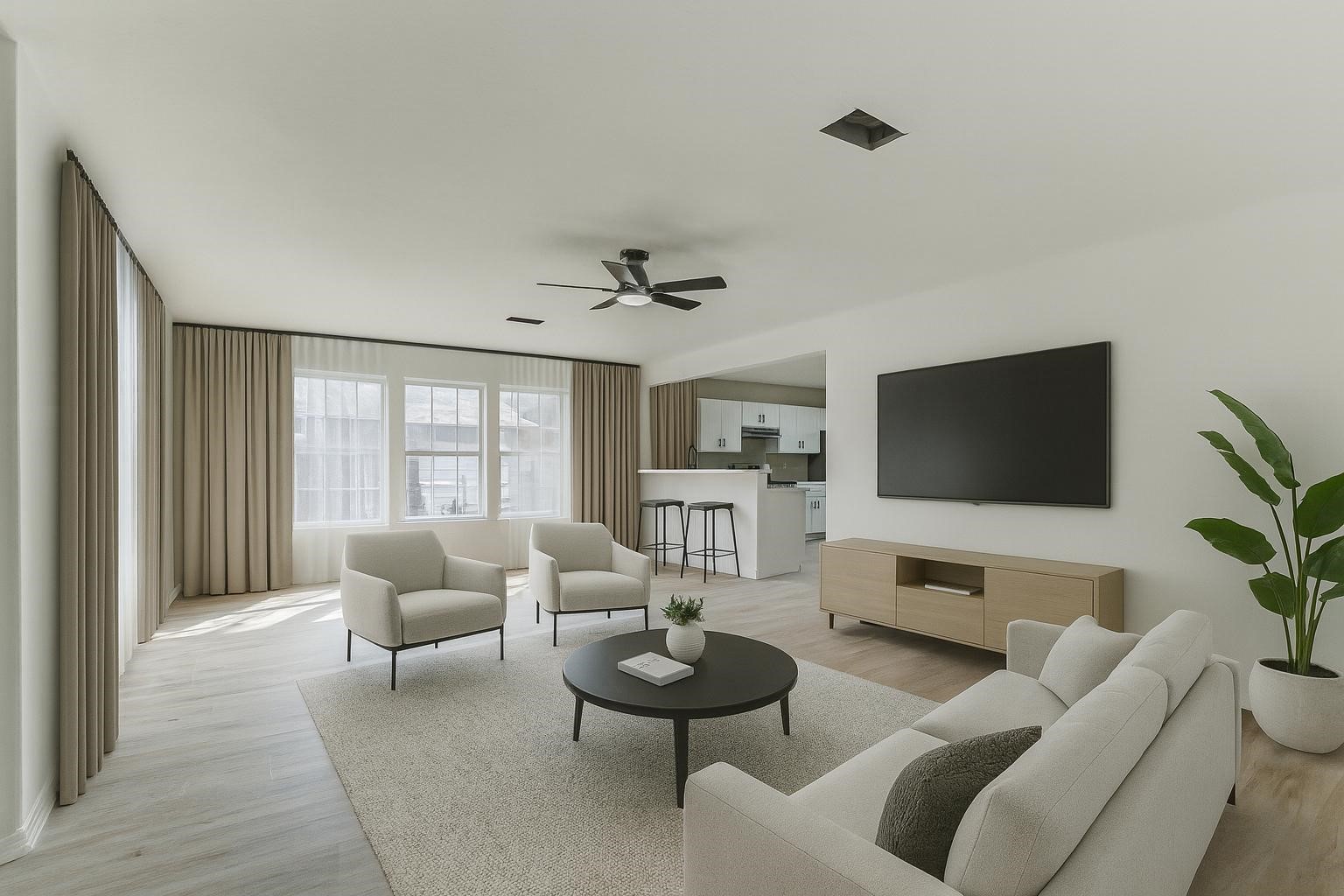 10102 Wiggins Street Houston, TX 77029 - Photo 2 of 26 a living room with furniture and a flat screen tv