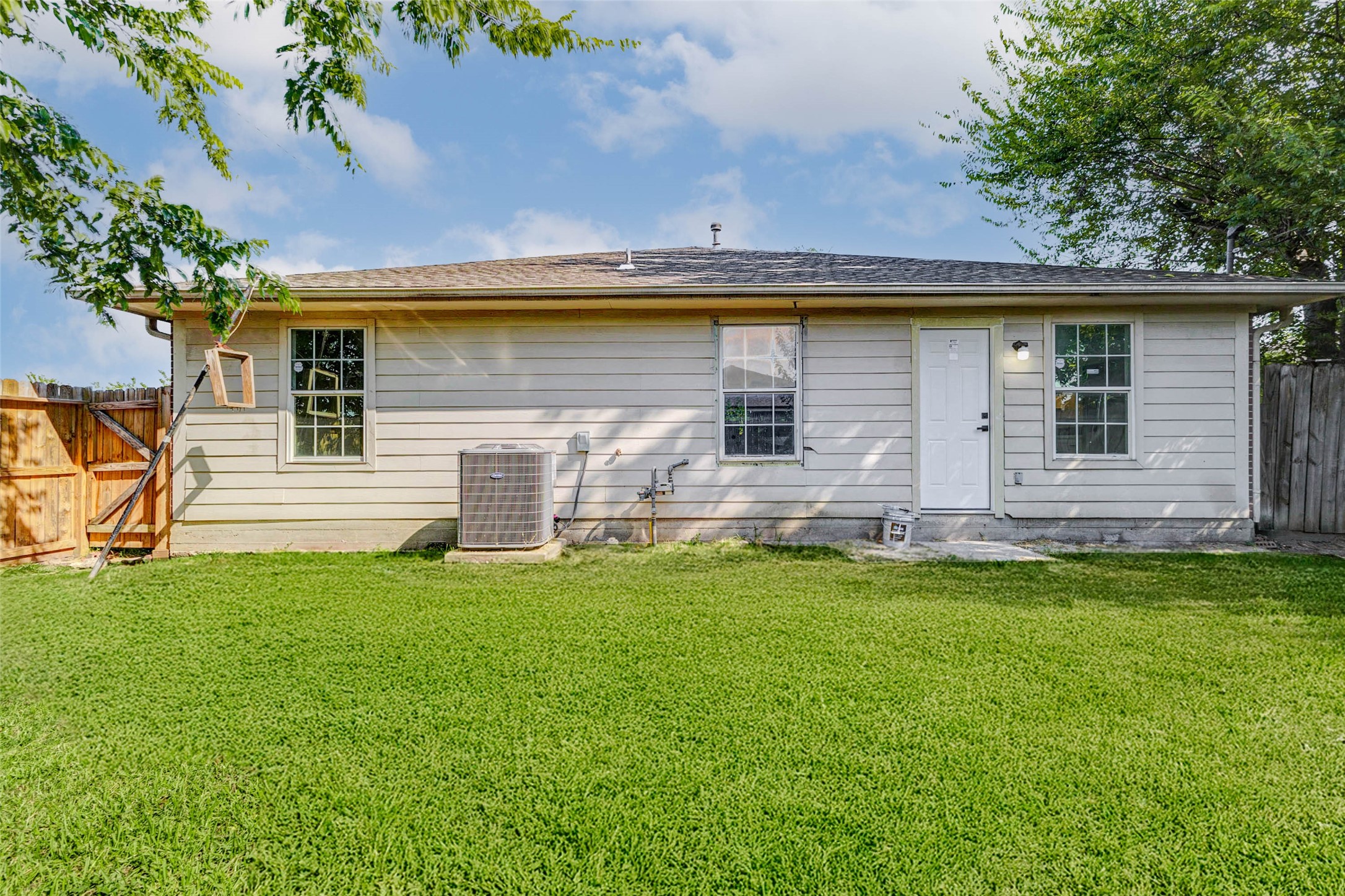 10102 Wiggins Street Houston, TX 77029 - Photo 24 of 26 a front view of house with yard and seating area