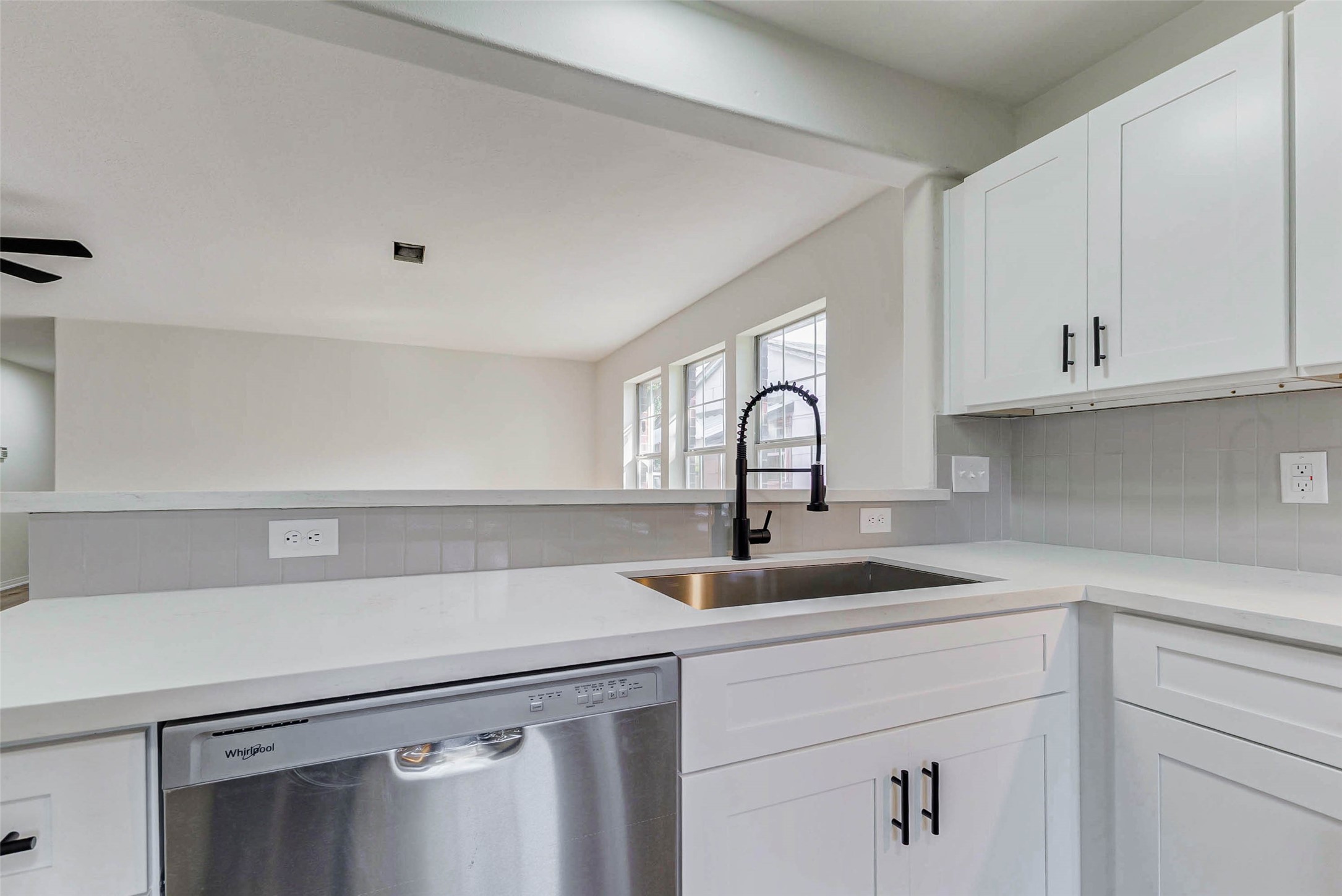 10102 Wiggins Street Houston, TX 77029 - Photo 6 of 26 a kitchen with a sink and cabinets