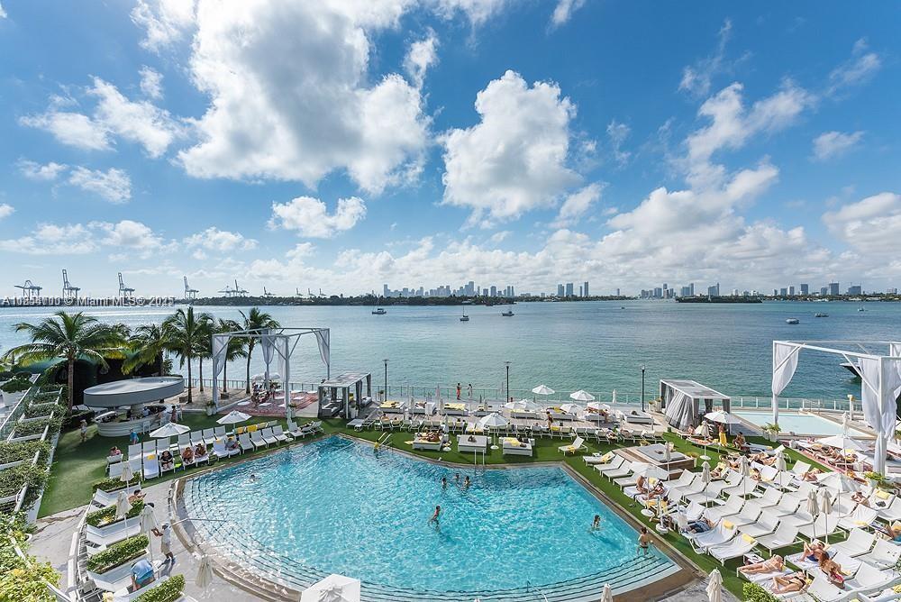 1100 West Avenue, Unit 425 Miami Beach, FL 33139 - Photo 1 of 17 a view of a lake with houses in the back
