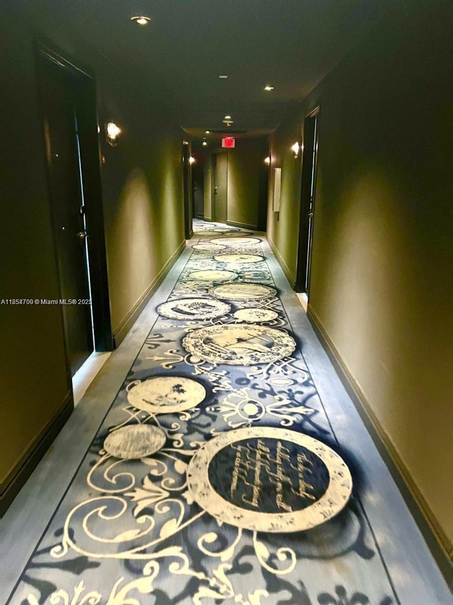 1100 West Avenue, Unit 425 Miami Beach, FL 33139 - Photo 13 of 17 a bathroom with a sink and a mirror
