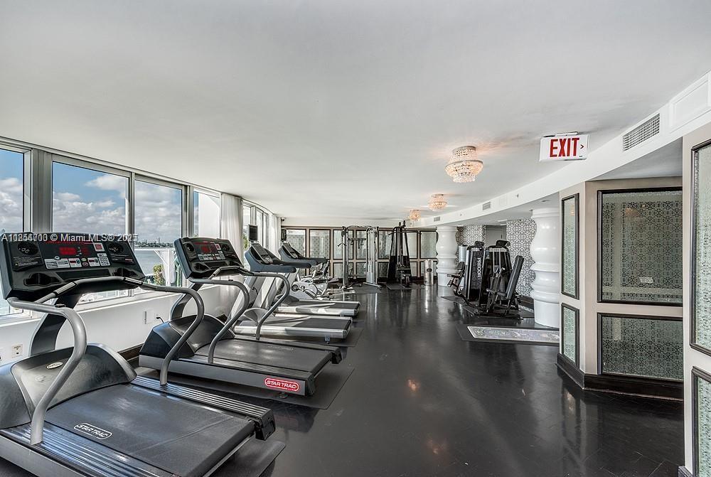 1100 West Avenue, Unit 425 Miami Beach, FL 33139 - Photo 5 of 17 a very nice looking living room with dining room and windows