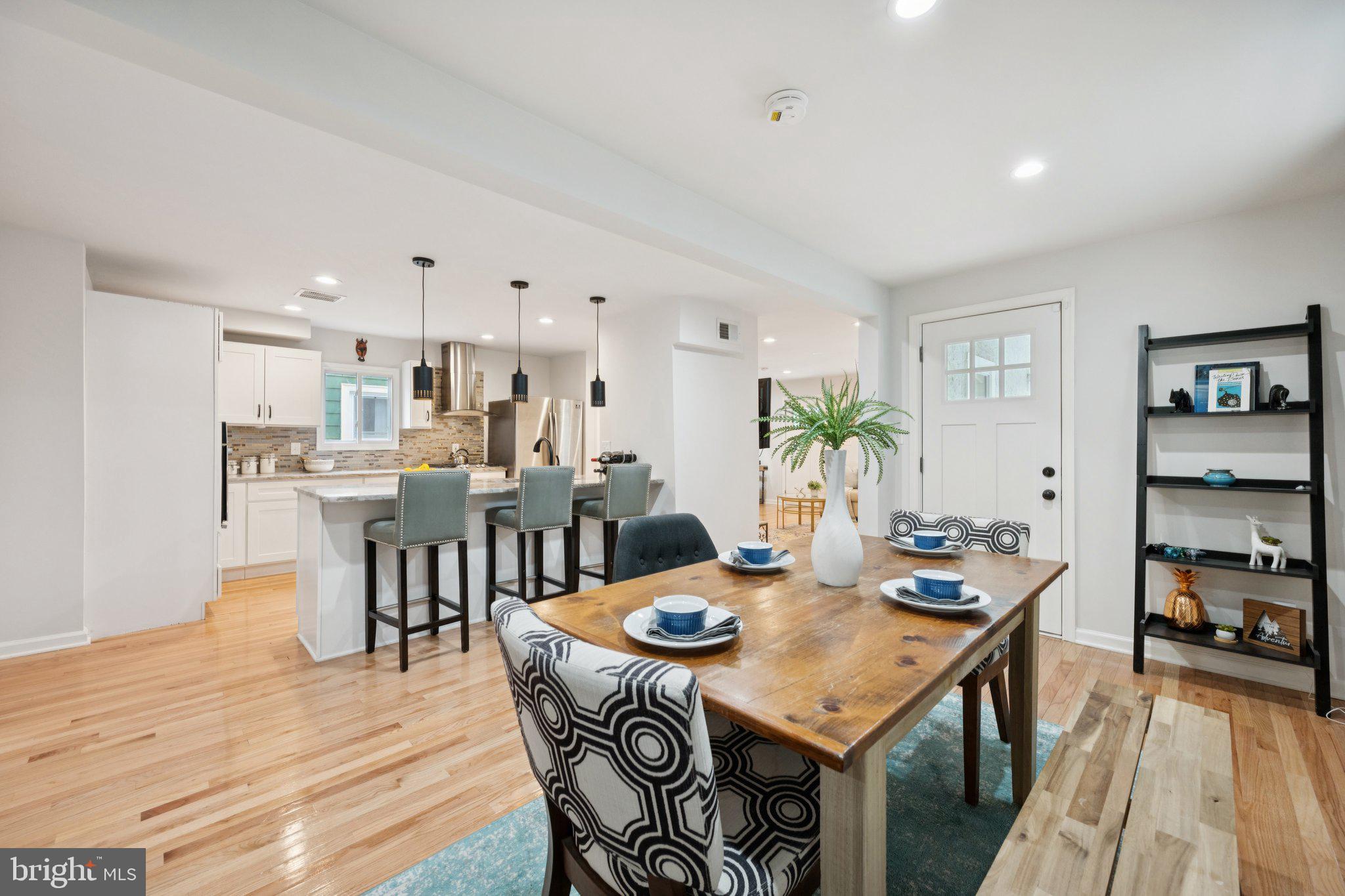 4014 37th Street Mount Rainier, MD 20712 - Photo 6 of 26 a view of a dining room with furniture and wooden floor