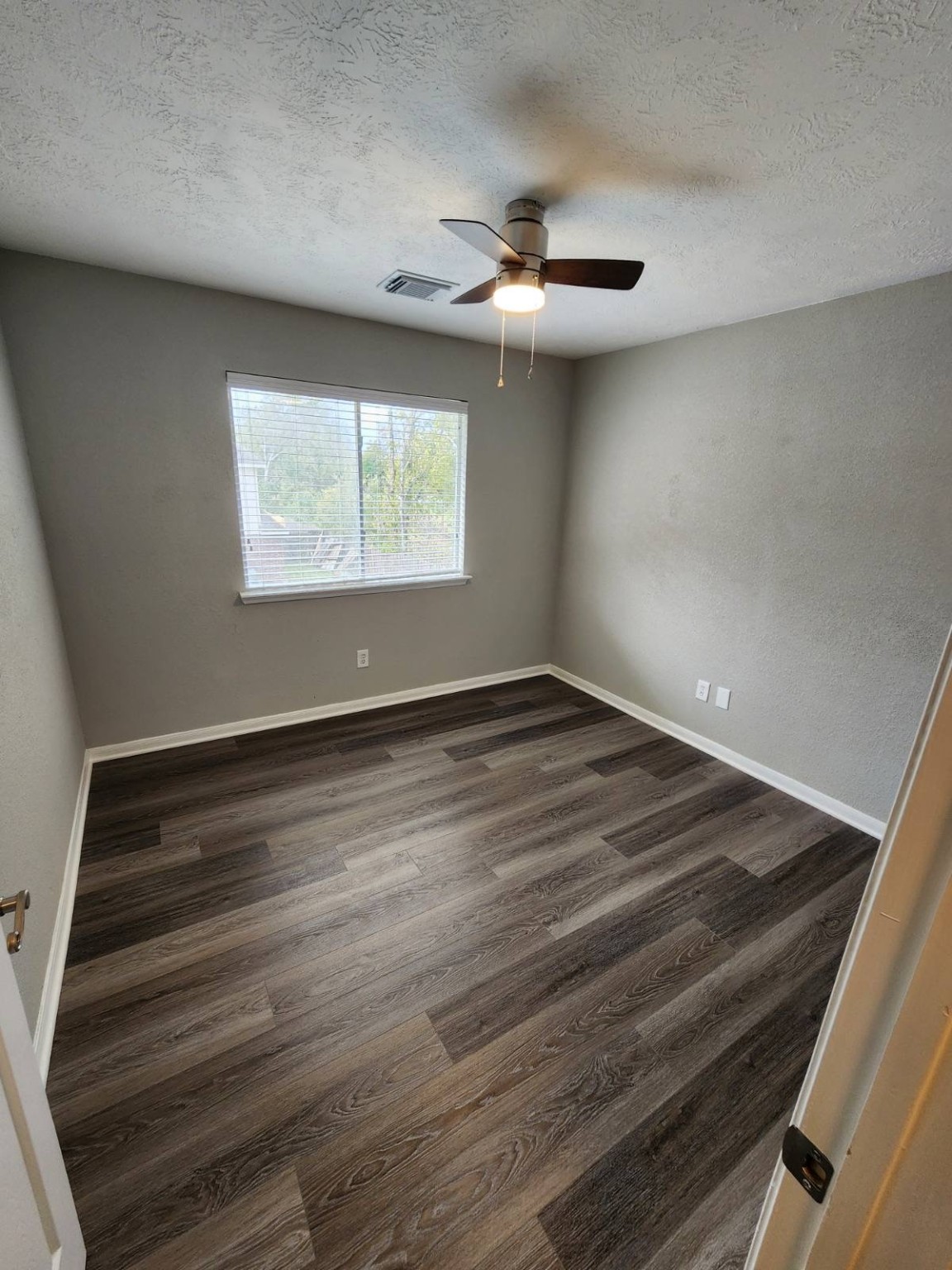 16302 Flint Run Way Sugar Land, TX 77498 - Photo 24 of 27 wooden floor in an empty room
