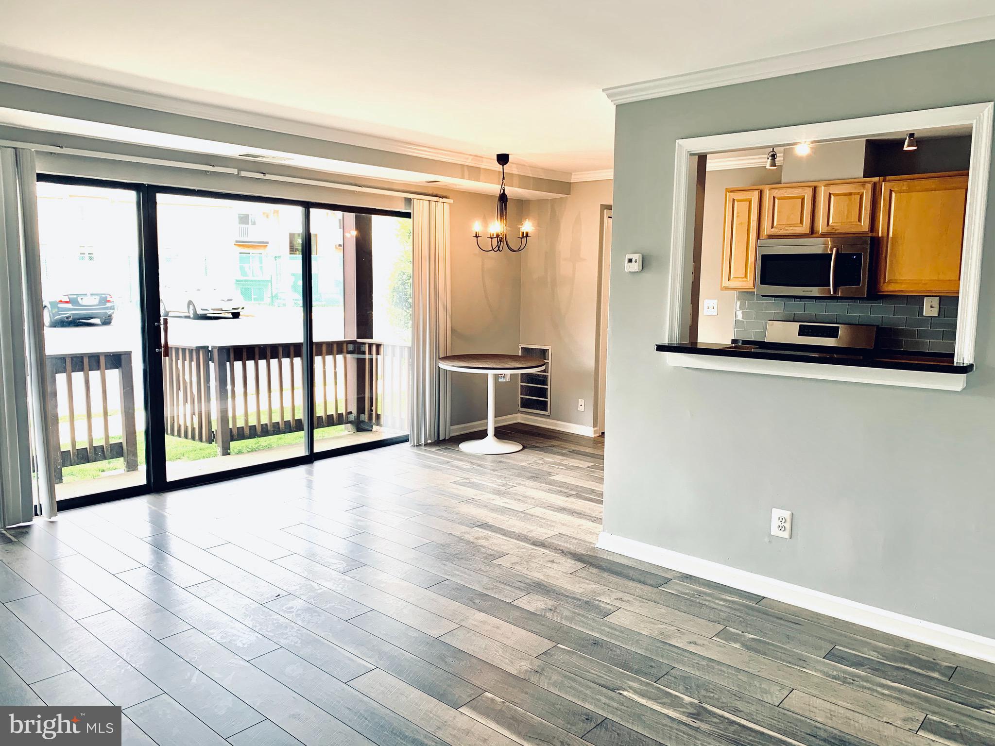 2754 Hollywood Road, Unit 101 Falls Church, VA 22043 - Photo 1 of 9 Spacious Living room walking out to Patio