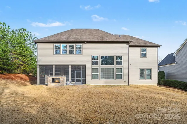 a living room with patio furniture