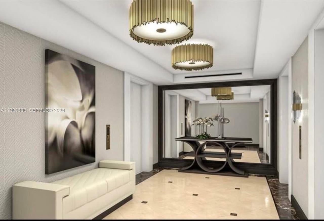 9801 Collins Avenue, Unit 19H Bal Harbour, FL 33154 - Photo 23 of 28 a room with table and chairs