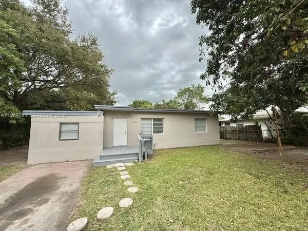 front view of house with a yard